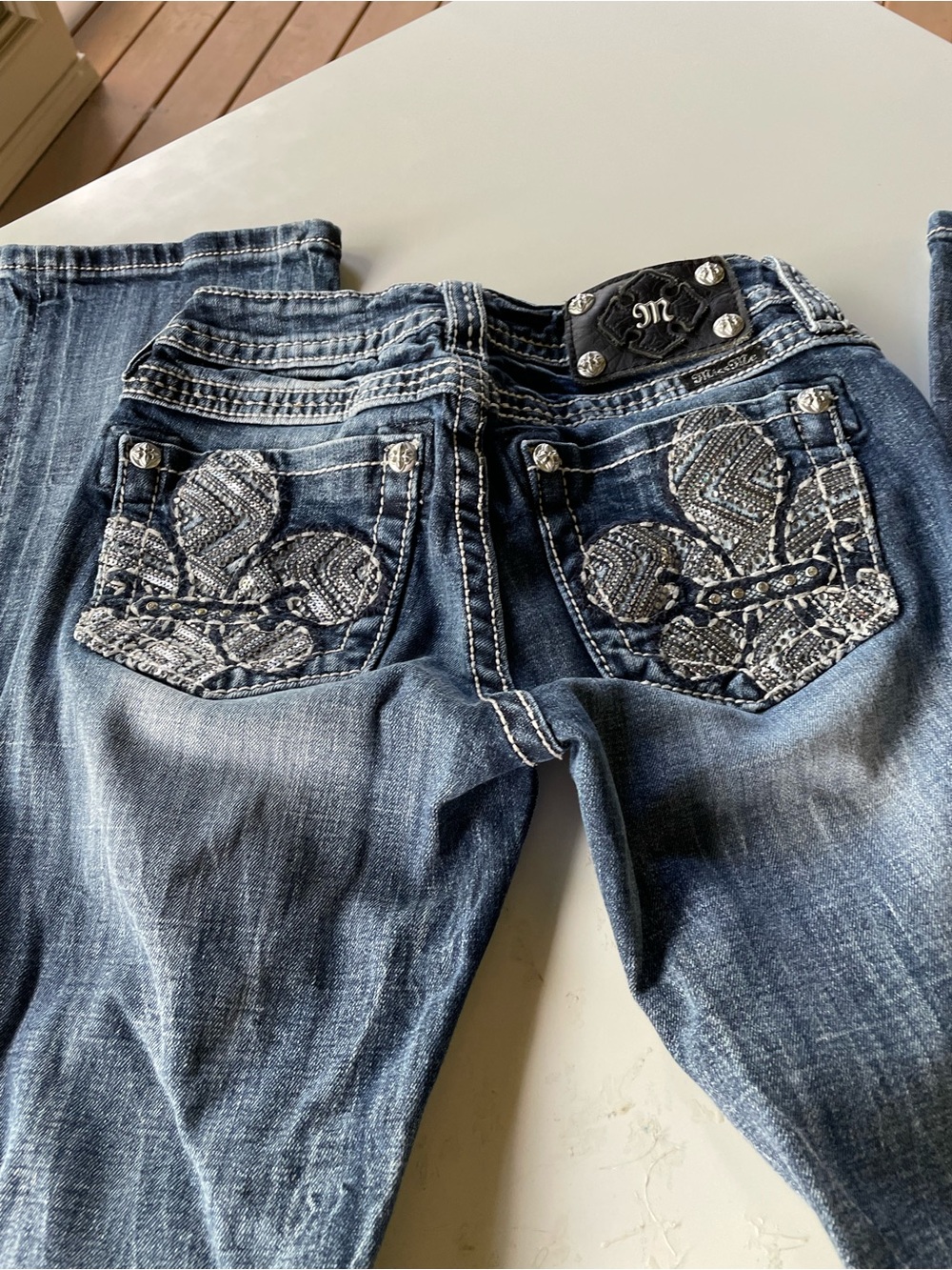 Miss Me Oversized Sequin Fleur-de-Lis Embroidered Dark Blue Boot Cut Jeans